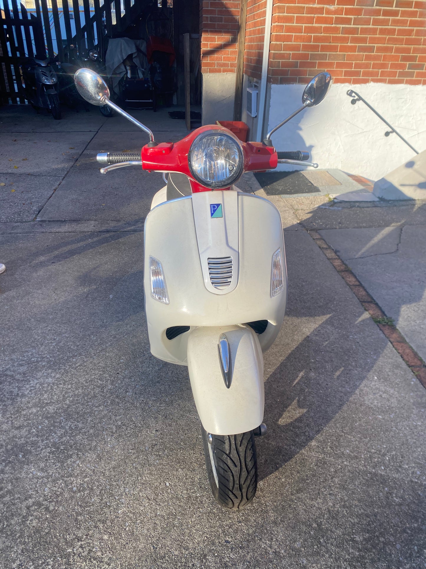 White/Red Vespa Super Scooter