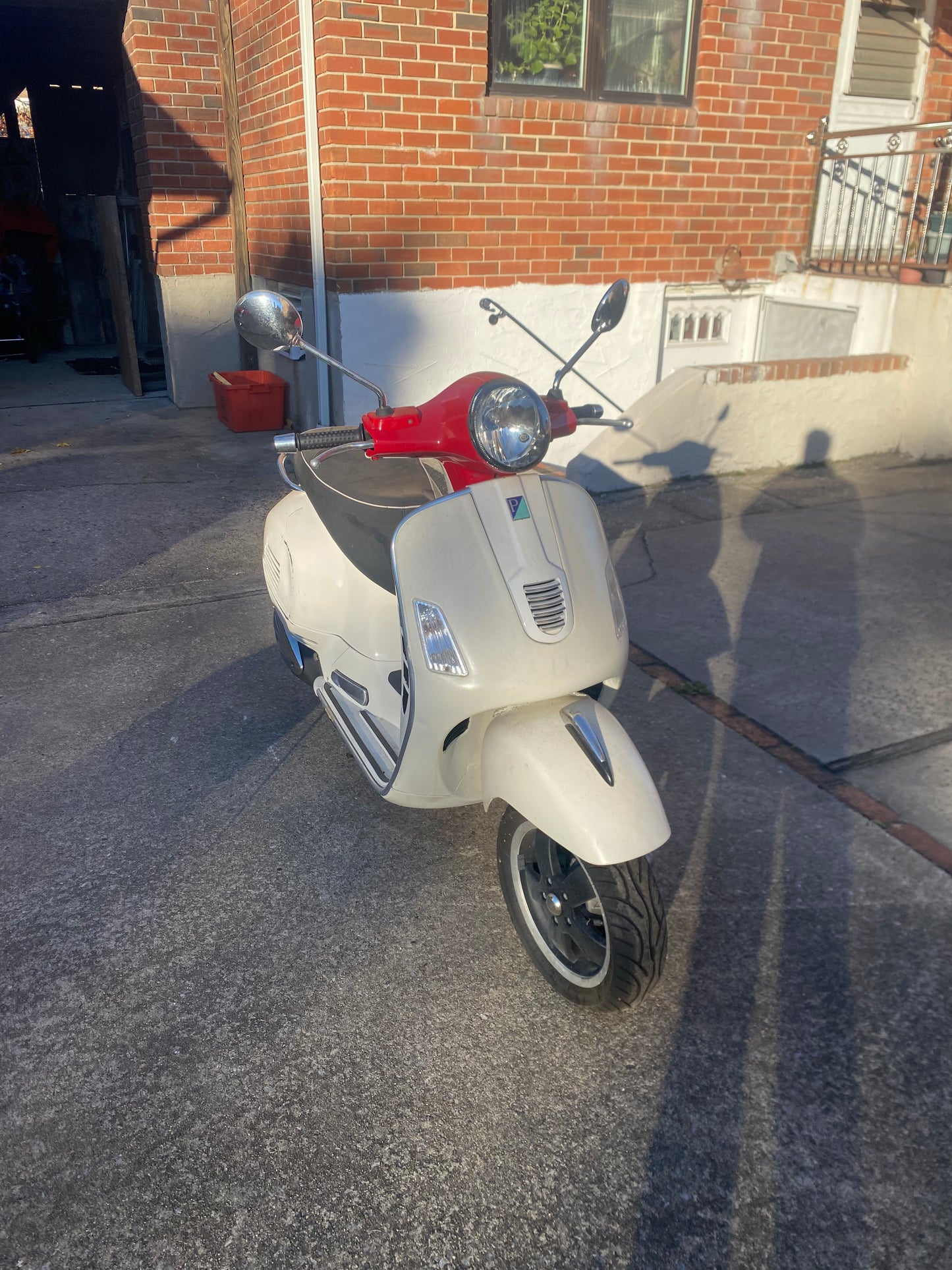 White/Red Vespa Super Scooter